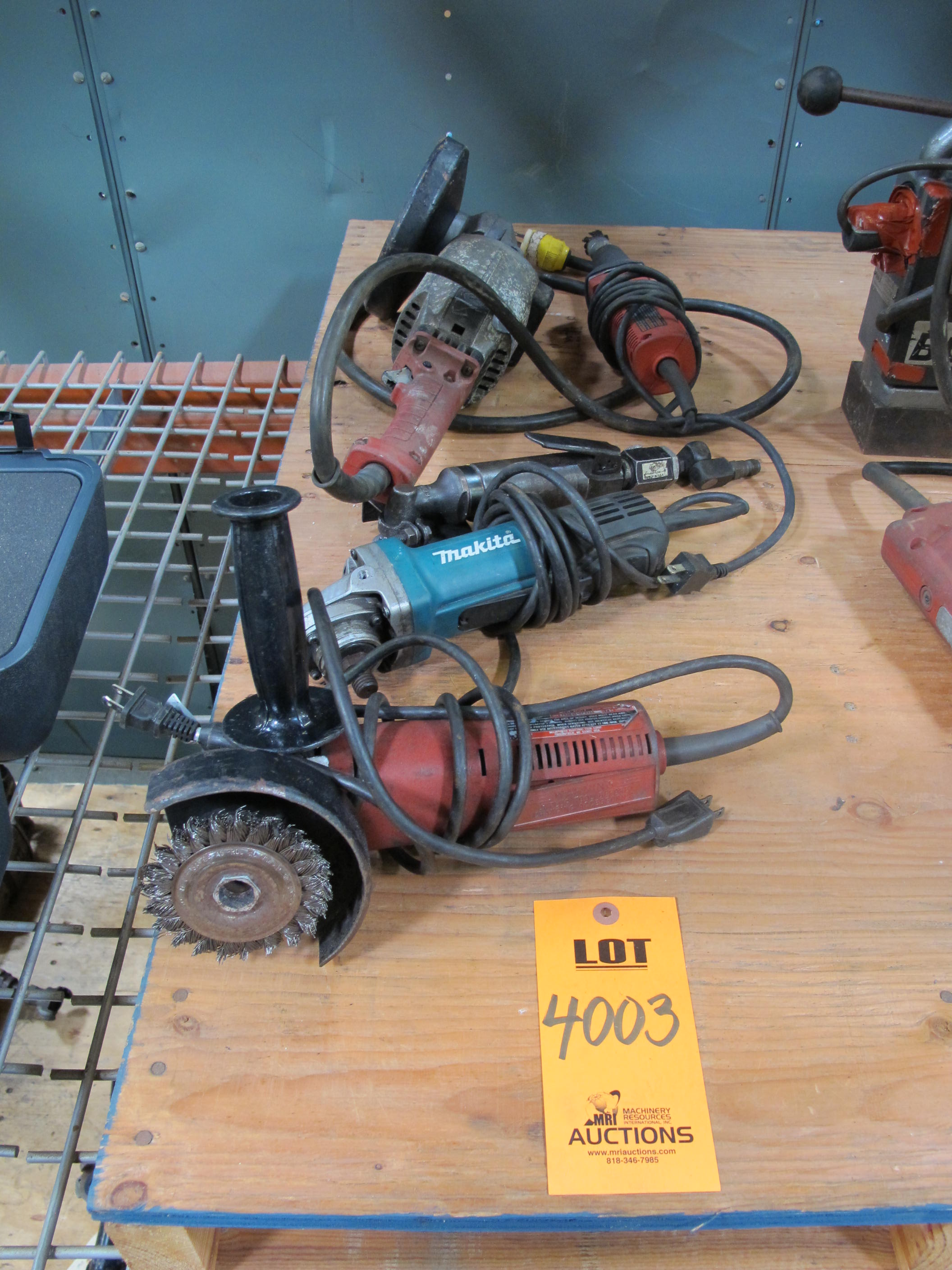 LOT TO INCLUDE: (3) MILWAUKEE ELECTRIC GRINDERS, (1) MAKITA ELECTRIC GRINDER, (1) AIRFLO PNEUMATIC AIR GRINDER. LOADING & HANDLING FEE $5-4003